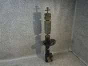 Амортизатор задний левый